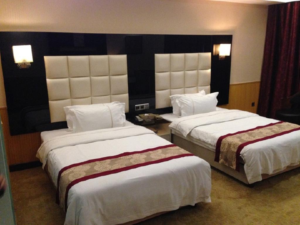 Tianguo Times Hotel Foshan Room photo