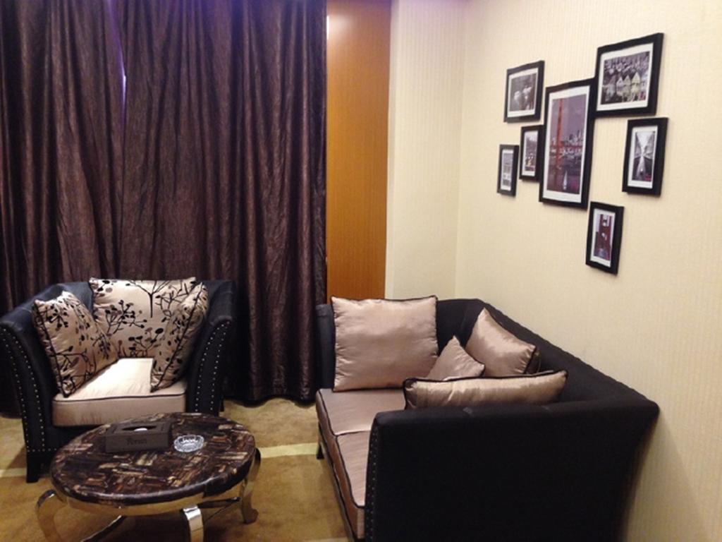 Tianguo Times Hotel Foshan Room photo